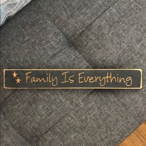 "Family is everything" wooden home sign